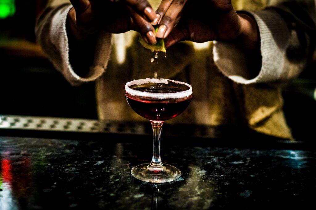 bartender making craft cocktails as a date idea